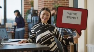 portrait-business-woman-holding-speech-bubble-show-job-offer-advertising-hiring-recruitment-female-employee-using-text-message-board-give-business-career-opportunity-scaled.jpg